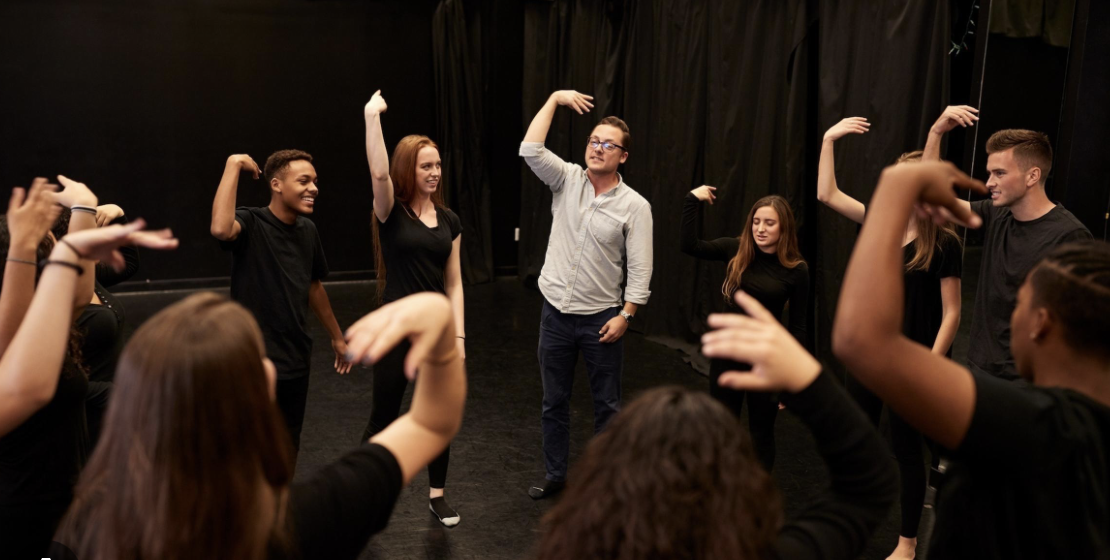 Young actors mid-scene during an ARSGO workshop
